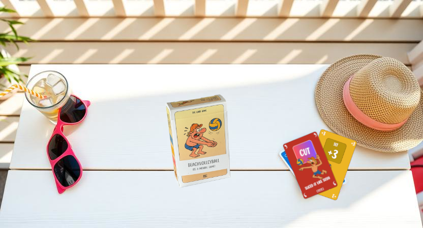 Card games for summer on a beach towel in the sand